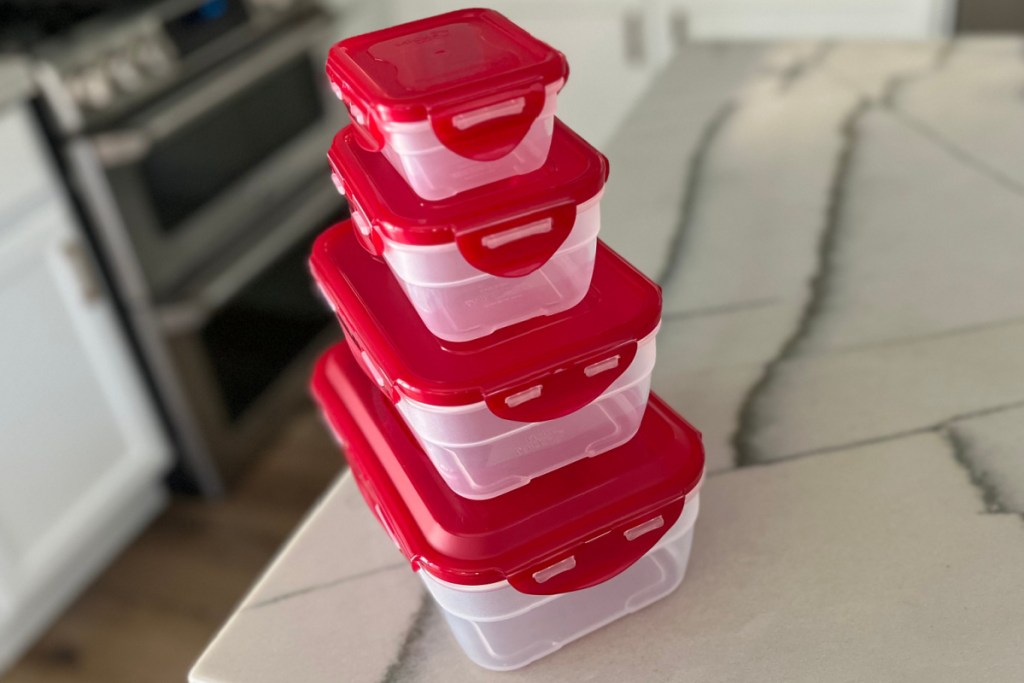 stack of red storage containers