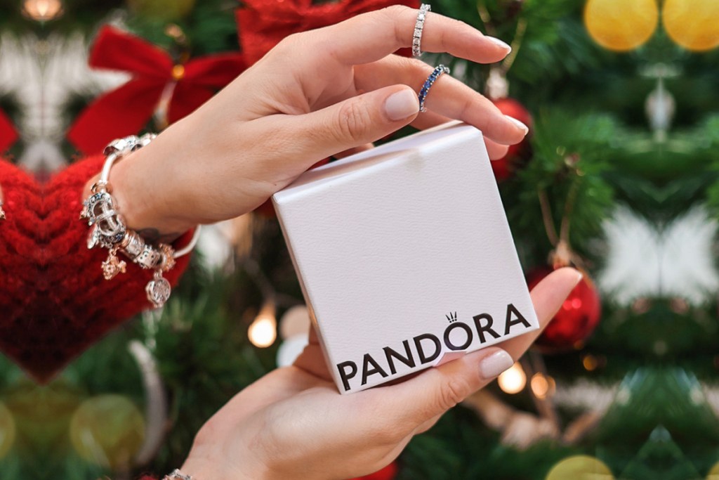 hands holding pandora box