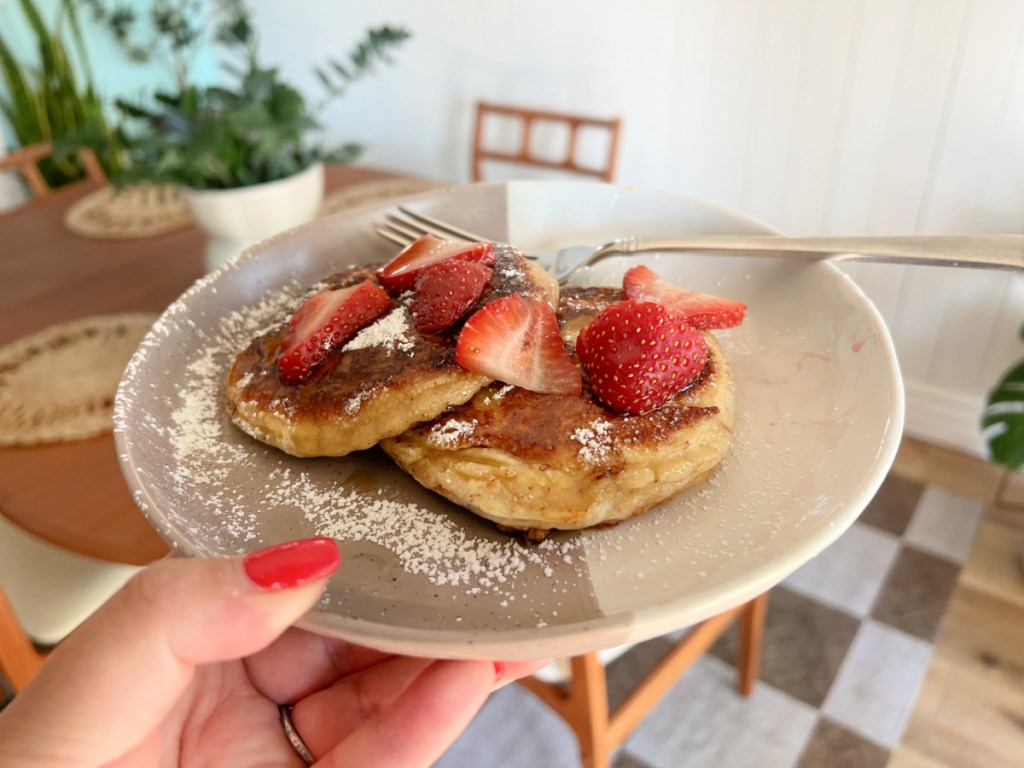 peanut butter and jelly french toast on a plate with fork