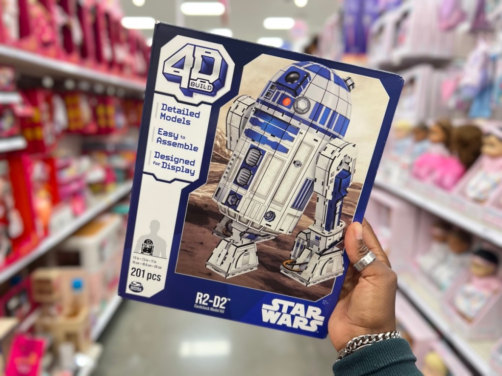 holding an R2D2 4D build