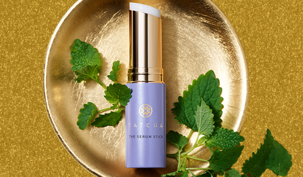 Tatcha Serum Stick laying in a gold bowl