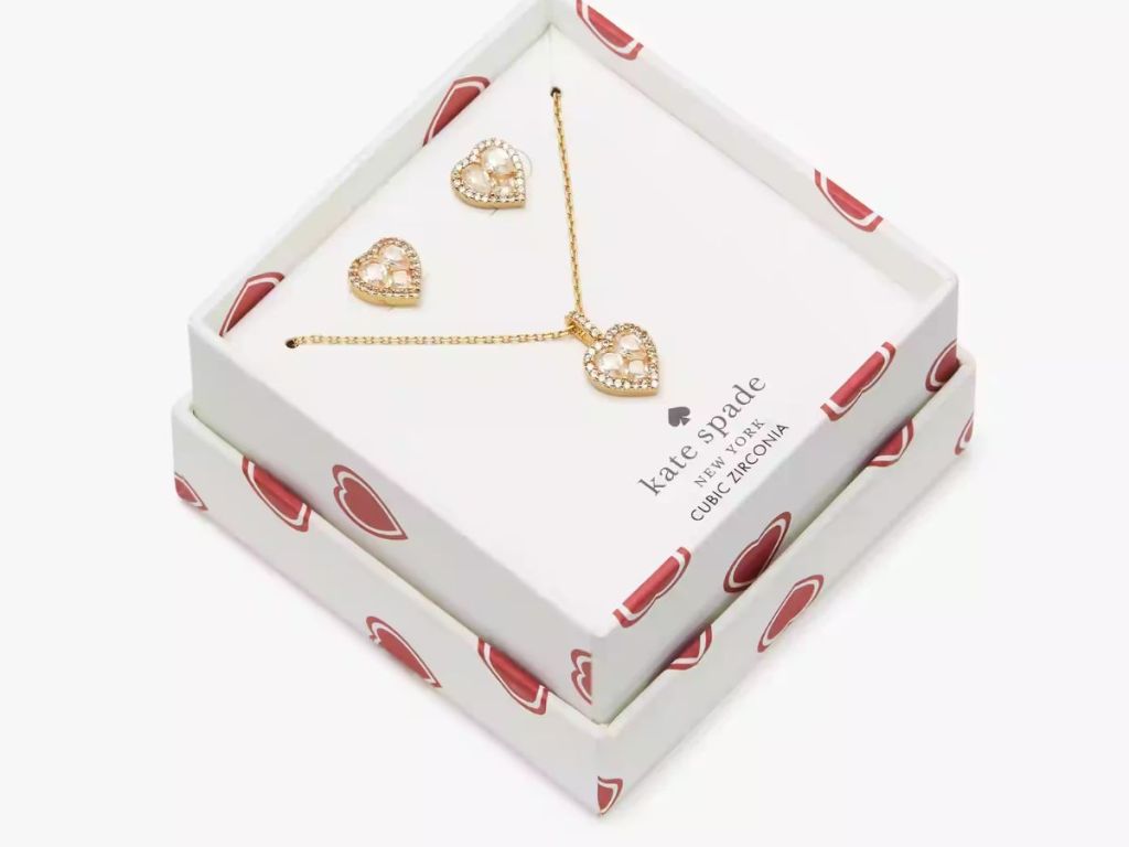 white gift box with red hearts and Kate Spade heart shaped necklace and earrings 