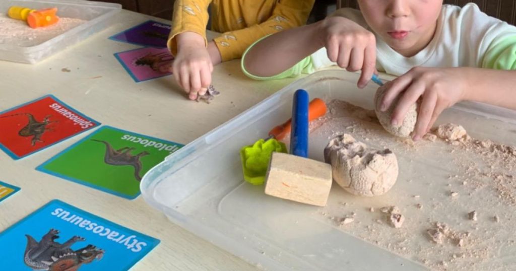 kids playing with Dig Up Dinosaur Fossil Eggs Kit