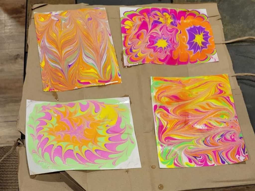 paper with marbling paint designs from the Dan&Darci Marbling Paint Art Kit for Kids