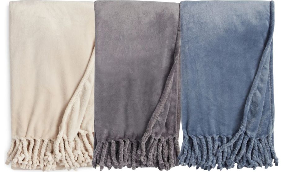 plush throws in assorted colors