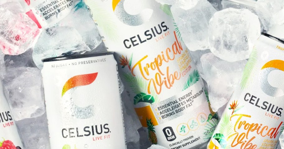 cans of CELSIUS Tropical Vibe energy drink on ice