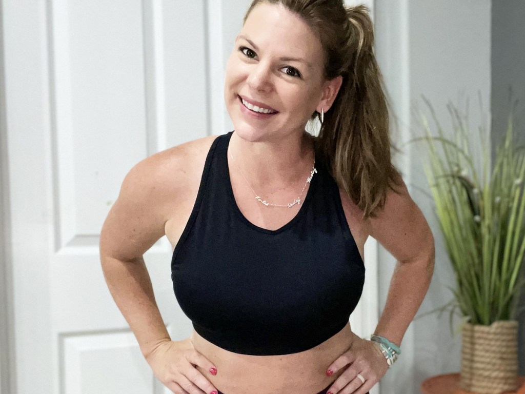 woman wearing a black sports bra