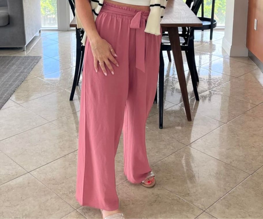 A woman wearing Feiersi Women Casual Wide Leg Pants in pink