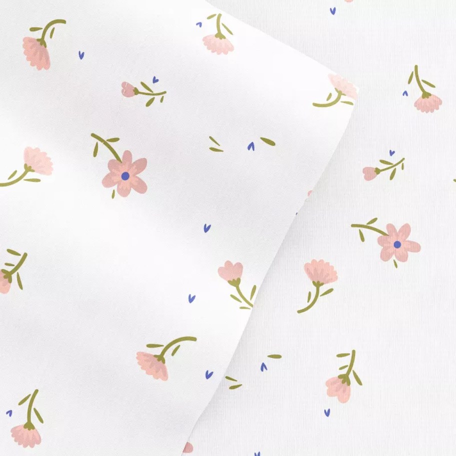 close up of pink floral sheet