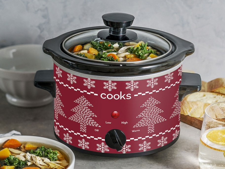 Holiday Slow Cooker in fair isle displayed next to the table