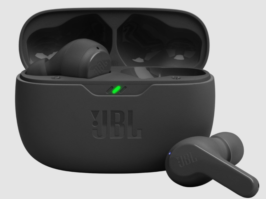 black earbuds next to charging case