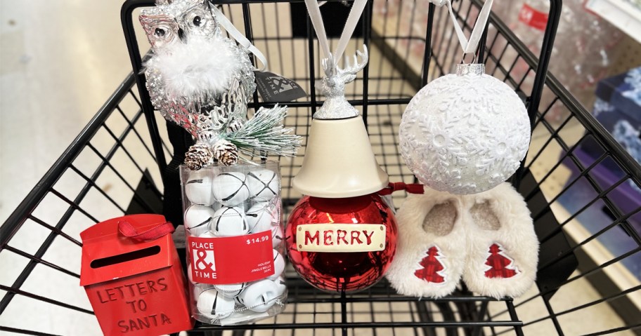 various christmas ornaments in a shopping cart