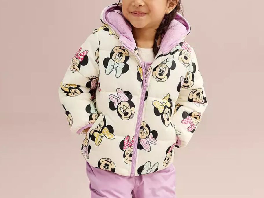 Toddler girl wearing a Minnie Puffer Jacket