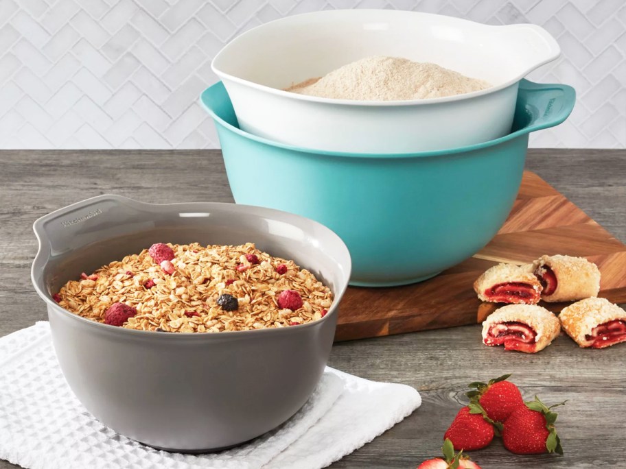 grey, white, and teal mixing bowls set on kitchen counter