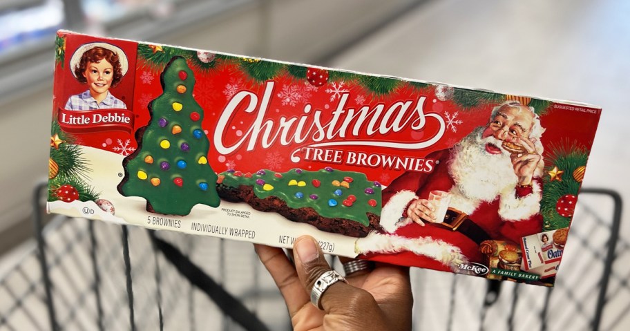 hand holding up a box of Little Debbie Christmas Tree Brownies