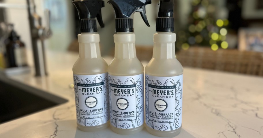 3 pack of Mrs Meyers Snow Drop Countertop Spray on kitchen counter