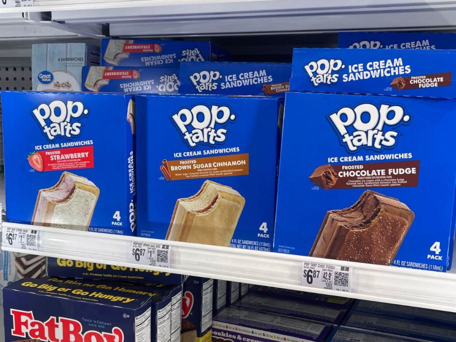 A freezer shelf at Walmart with 3 different flavors of Pop-Tarts Ice Cream Sandwiches