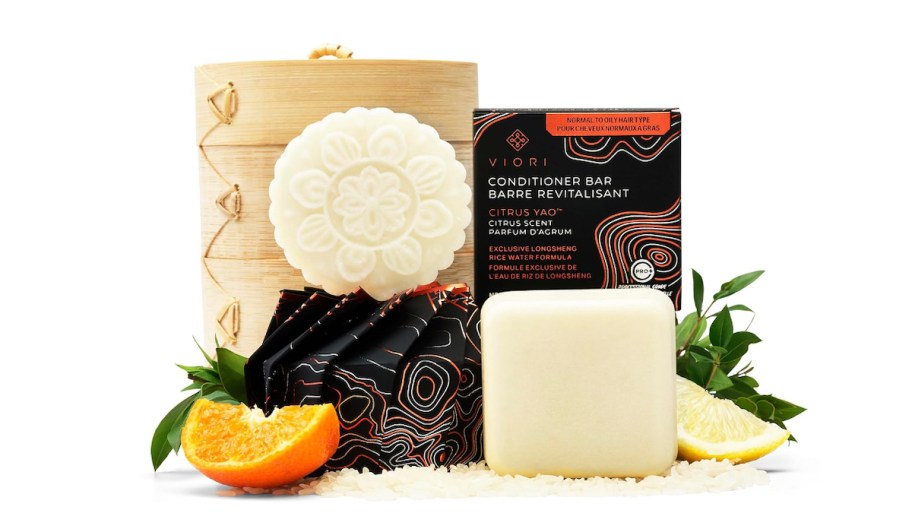 stock photo of bar shampoo and conditioner with bamboo holders