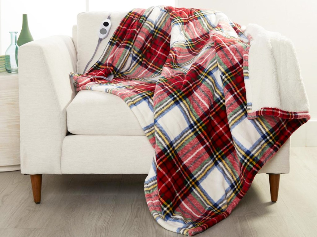 plaid heated throw on white chair