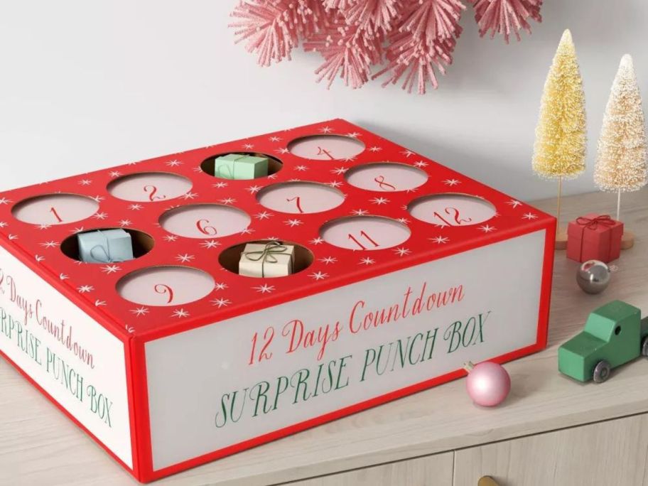 A wondershop Punch Box Advent Calendar on a mantle