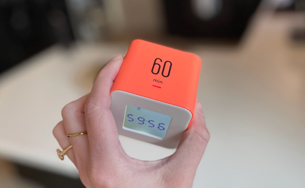 hand holding amazon flip timer cube