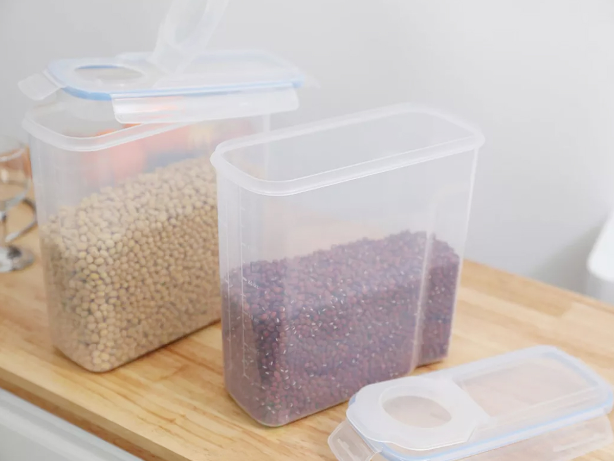 two cereal containers on table