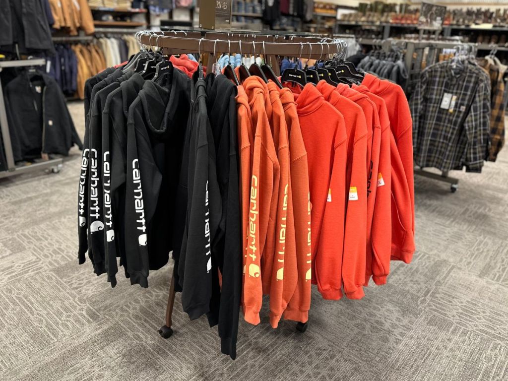 rack of Carhartt hoodies