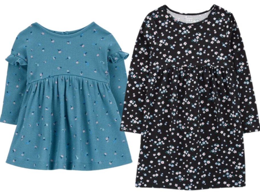 a baby's dress in blue with small flowers and a little girl's dress in black with a floral print