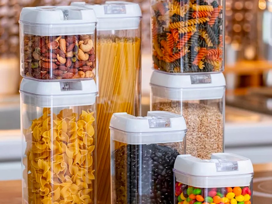 7 piece food storage set on counter full of pasta