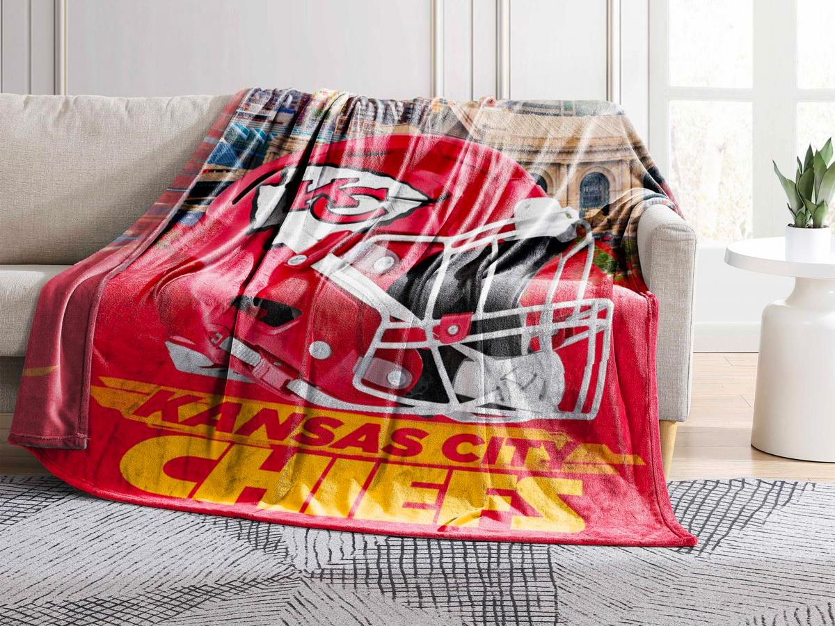 kansas city chiefs oversized throw spread across a sofa