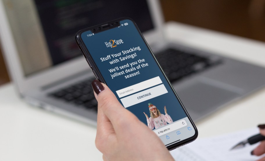 hand holding phone with hip2save email signup list page