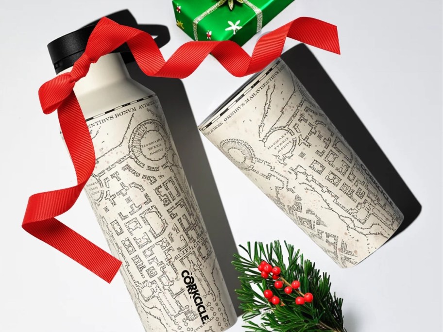 two harry potter corkcicle mugs on white background with christmas ribbon and gifts