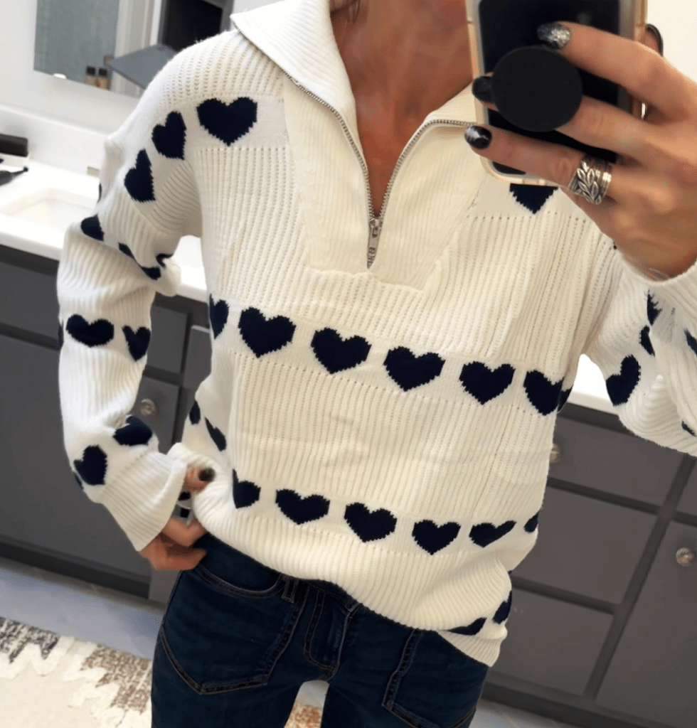 woman wearing heart sweater 