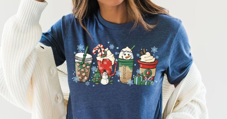 Woman wearing a Christmas coffee graphic tee