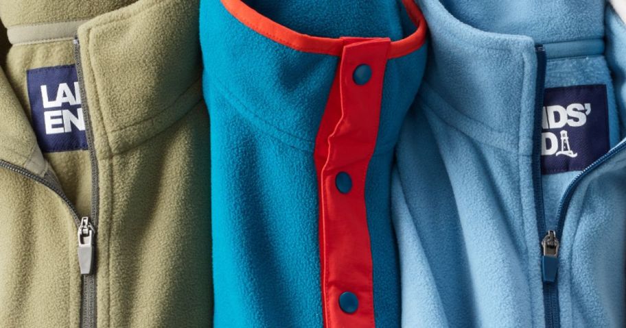 the collars of 3 Lands End Fleece Jackets