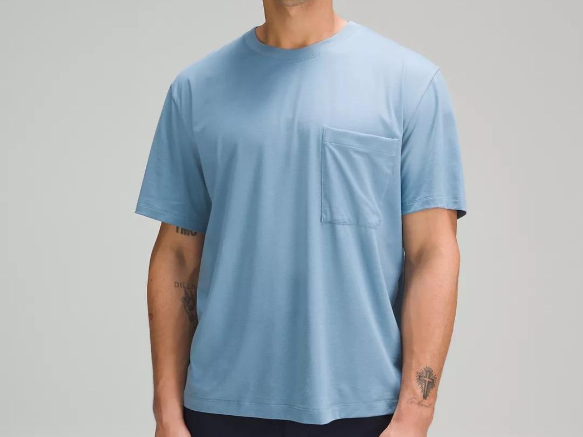 man wearing blue tee