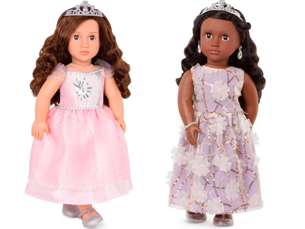 two dolls wearing pink and purple dresses and tiaras