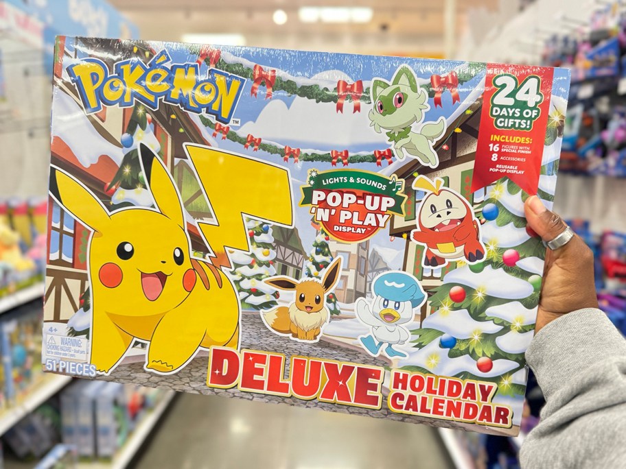 hand holding pokemon advent calendar in target 