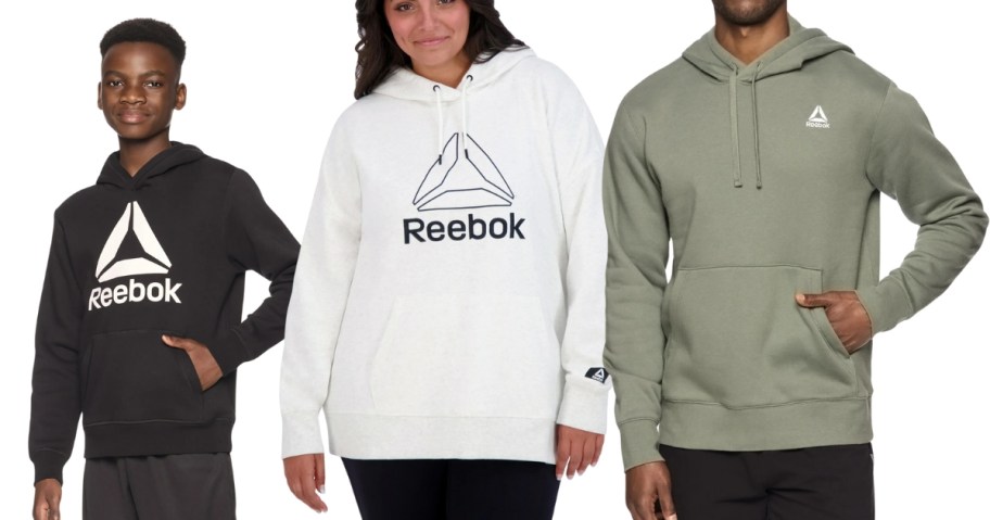 little boy, woman, and man all wearing different colors of Reebok logo hoodies