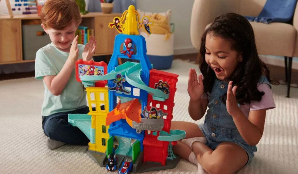 kids playing with spiderman toy