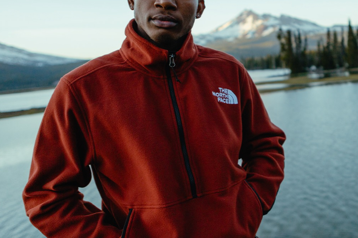 man wearing orange fleece outside