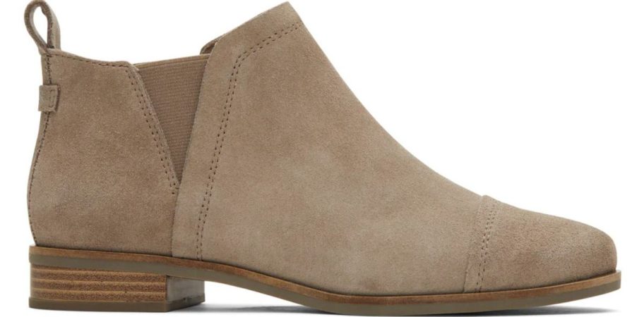 a beige low-heeled ankle bootie