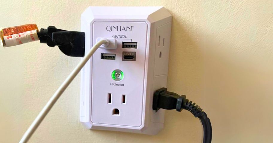 wall outlet extender shown with different plugs