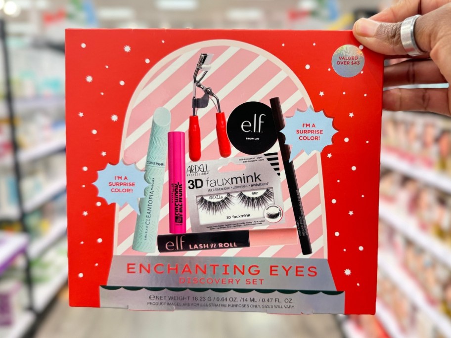 hand holding a red box that's a TwelveNYC Cosmetic Set - Eye Discovery gift set