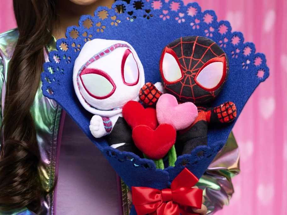 girl holding a Marvel Plush Valentine's Bouquet