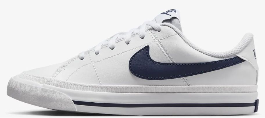 a blue and white nike kids sneaker