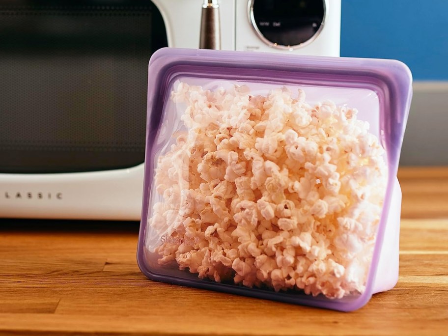 popcorn inside a purple stasher stand-up bag