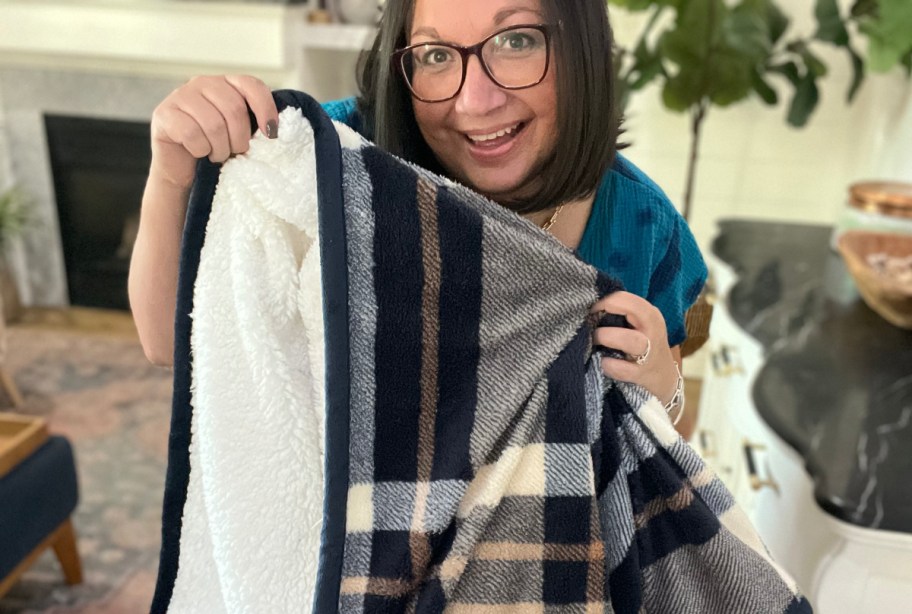 Woman showing kohls thow blanket