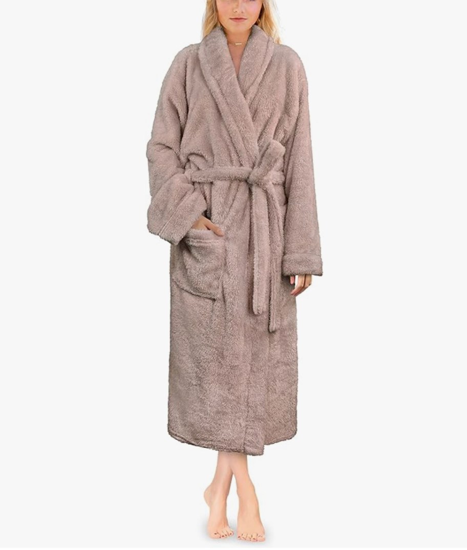 stock photo of woman wearing brown robe