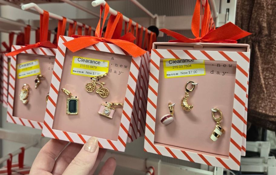 holiday jewelry charms on a store shelf